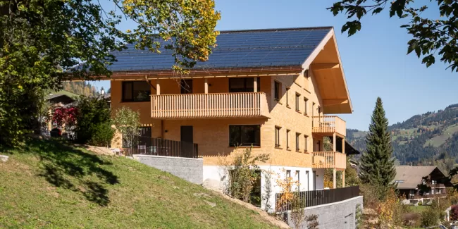 Mehrfamilienhaus, Truberholz, Wände, Brettschicht, Tradition, Zweisimmen, Berner Oberland, Zimmermann, Zimmerin, Projektleiter, Archithektur, Baubetreuung, Trub, Längengrund